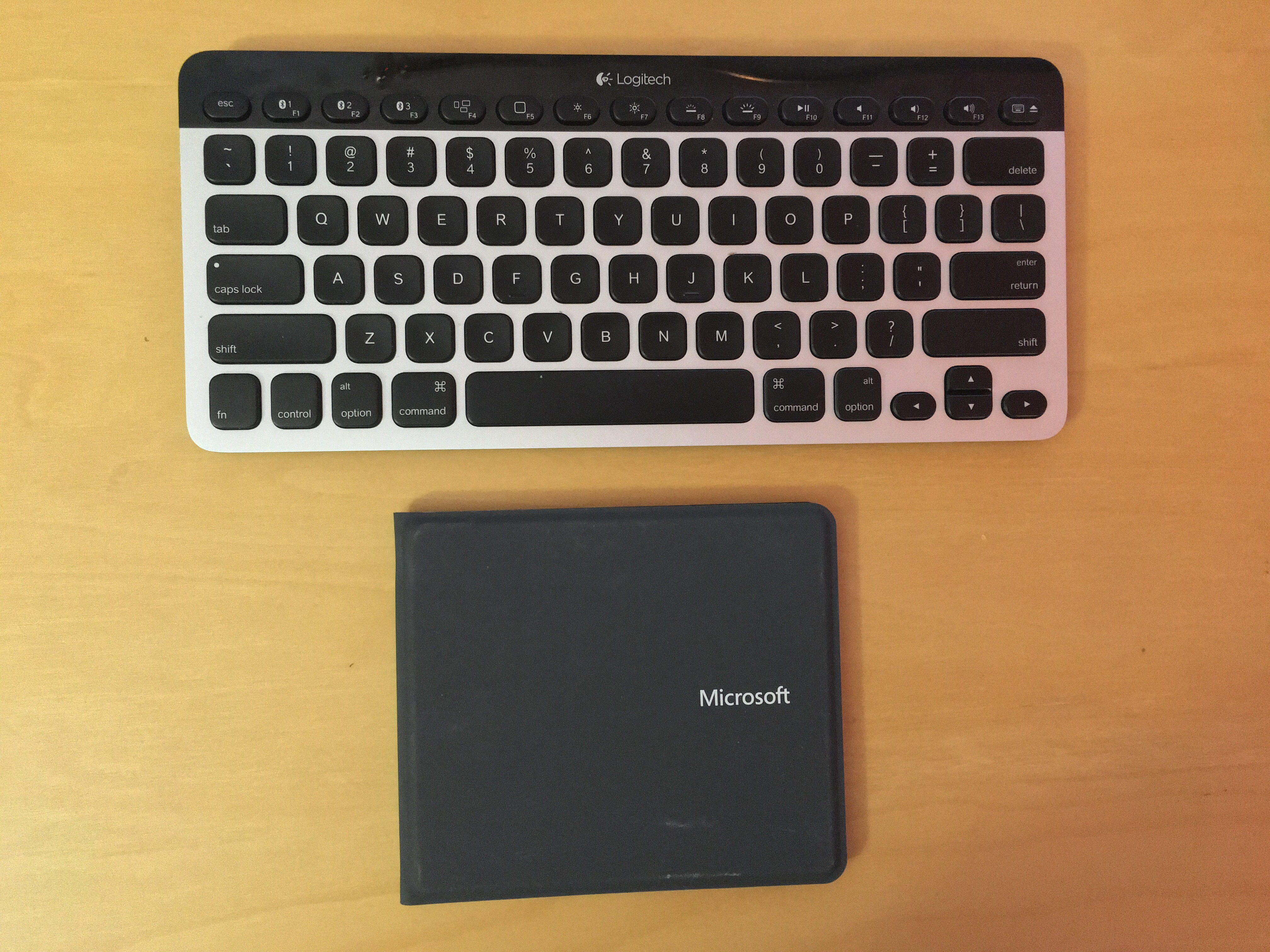 The Microsoft Universal Foldable Keyboard is half the size and a tad lighter than the Logitech K811 Easy-Switch Keyboard