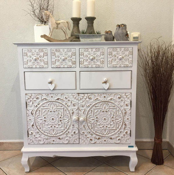 White commode with dekoration