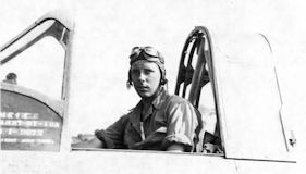 Cadet in plane cockpit, window open