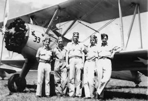 Cadets in front of plane on airfield